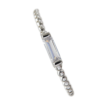 ADRIENNE - Spiraled Baguette Ring
